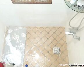 Asian teen brunette in shower webcam show