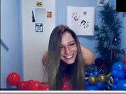 Two naked ladies are eating bananas