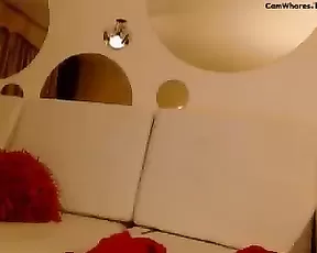 A brunette is submissive while suckling toys on cam