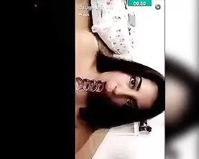 Raven haired girl is showing off