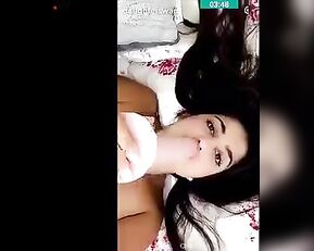 Raven haired girl is showing off