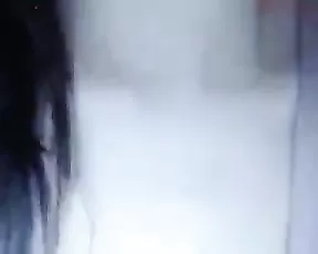 Big breasted black haired slut licks a dildo