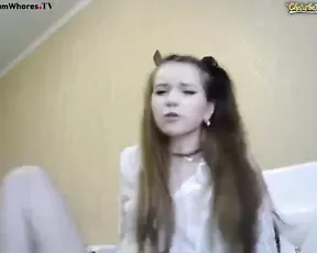 Teen plays with a large dildo