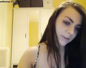 Redhead plays with her dildo