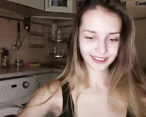 Sweet slim teen teasing on kitchen webcam show
