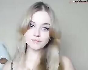 Beautiful blonde teasing naked tits webcam show