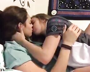 Sexy teen lesbians in bed kissing webcam show
