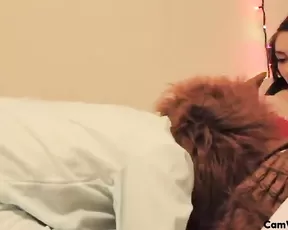 Asian woman uses a dildo