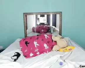 Black chick plays with her pussy