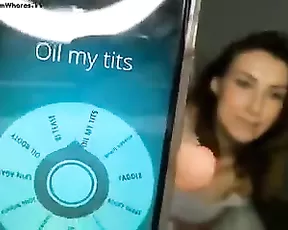 Brunette is showing her tits