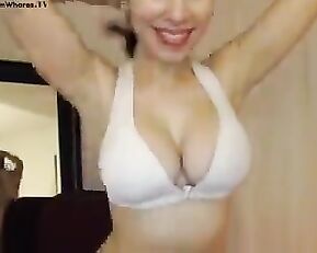 Busty bimbo is naked, showing off
