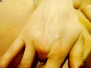 Tanned chick masturbating with a bottle