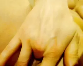 Tanned chick masturbating with a bottle