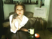 Two girls are using a strap on