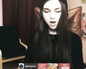 A brunette is teasing her cunt