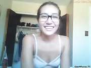 Very slim nude teen in glasses teasing webcam show