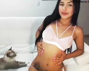 Beautiful slim teen brunette teasing in bed webcam show