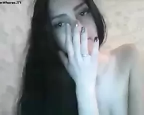A chick lifts up her shirt